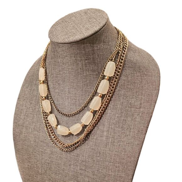 Sophia's Golden Elegance: A Four-Layered White Stone Bead Statement Necklace - Picture 4 of 10